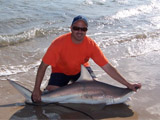 Benson with blacktip shark