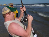 Douglas reeling in first bull shark San Luis Pass Texas