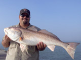 Oscar with Texas Redfish at the Surfside Jetty